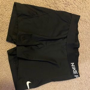 Black nike pros.